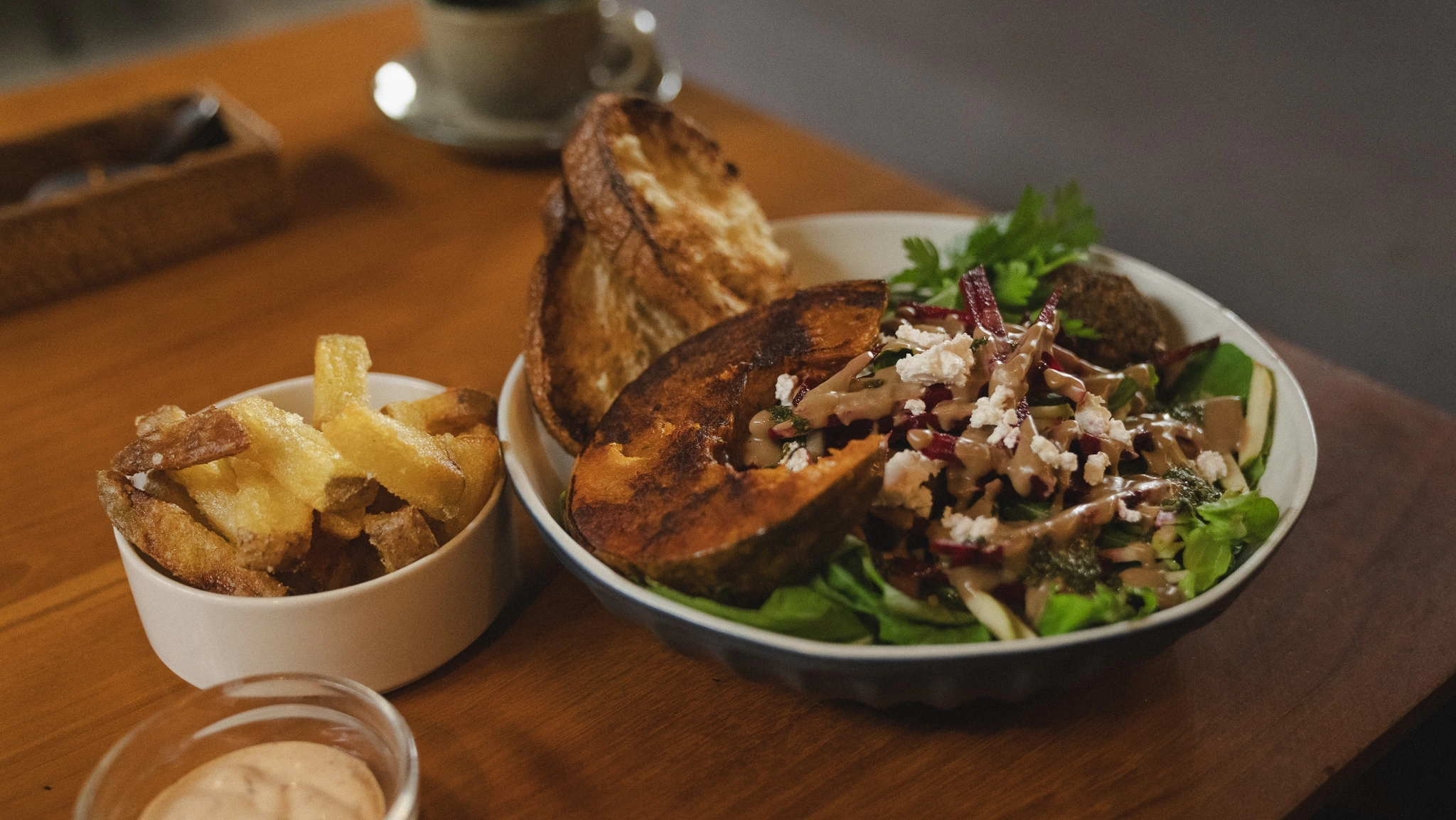 Pumpkin salad, fries and fresh bread at Black Sheep Ubud
