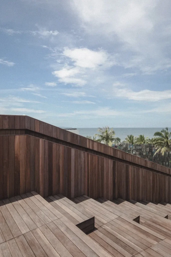Reclaimed ulin staircase overlooking the ocean at Potato Head Seminyak