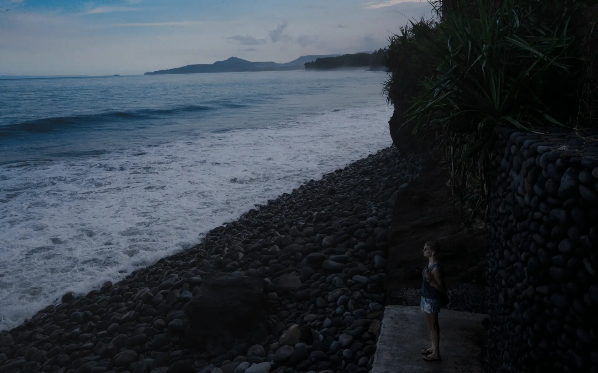 Batu Telu Beach black pebble coastline below Shunyata Villas in East Bali