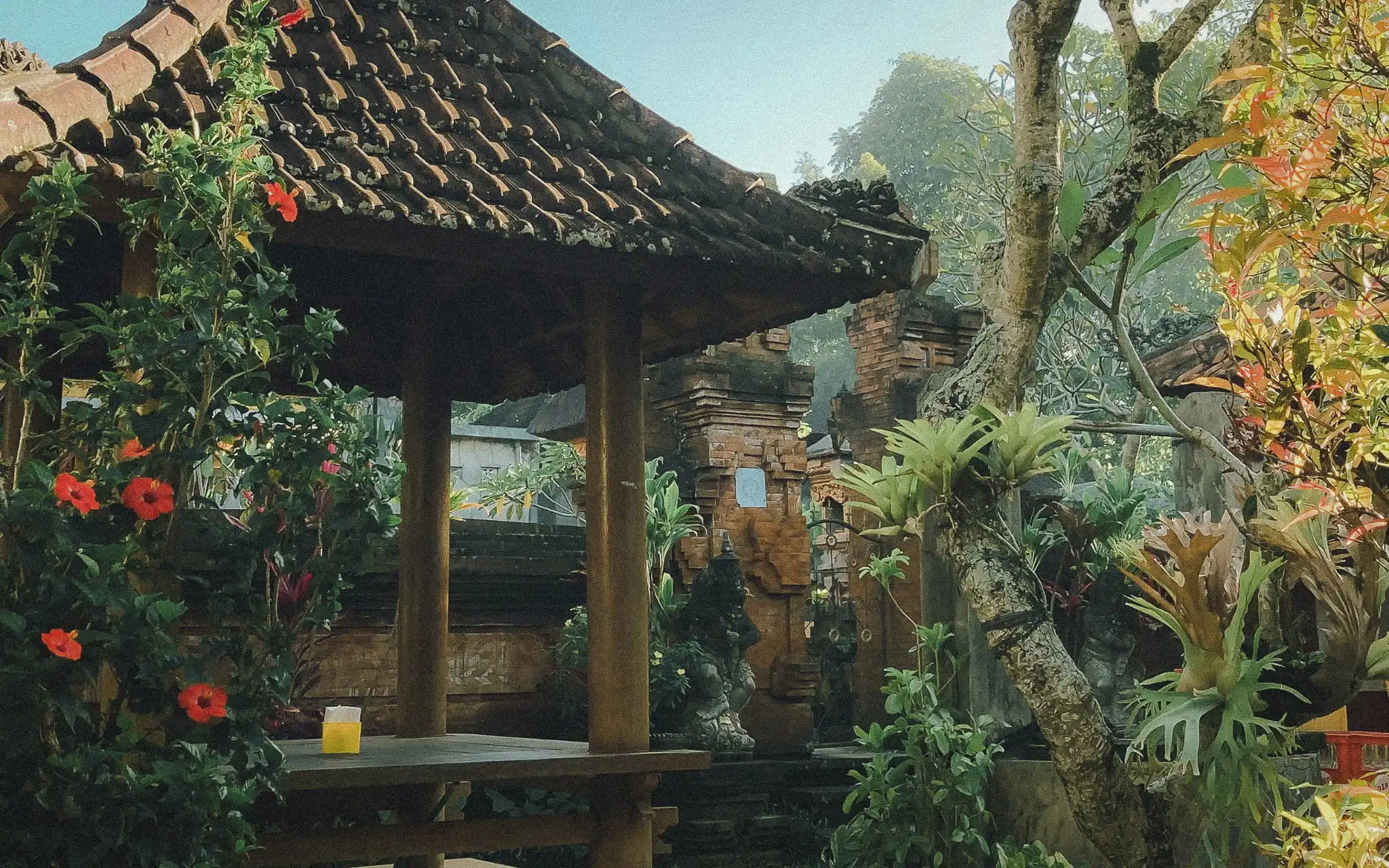 Traditional Balinese garden pavilion surrounded by mature tropical planting.