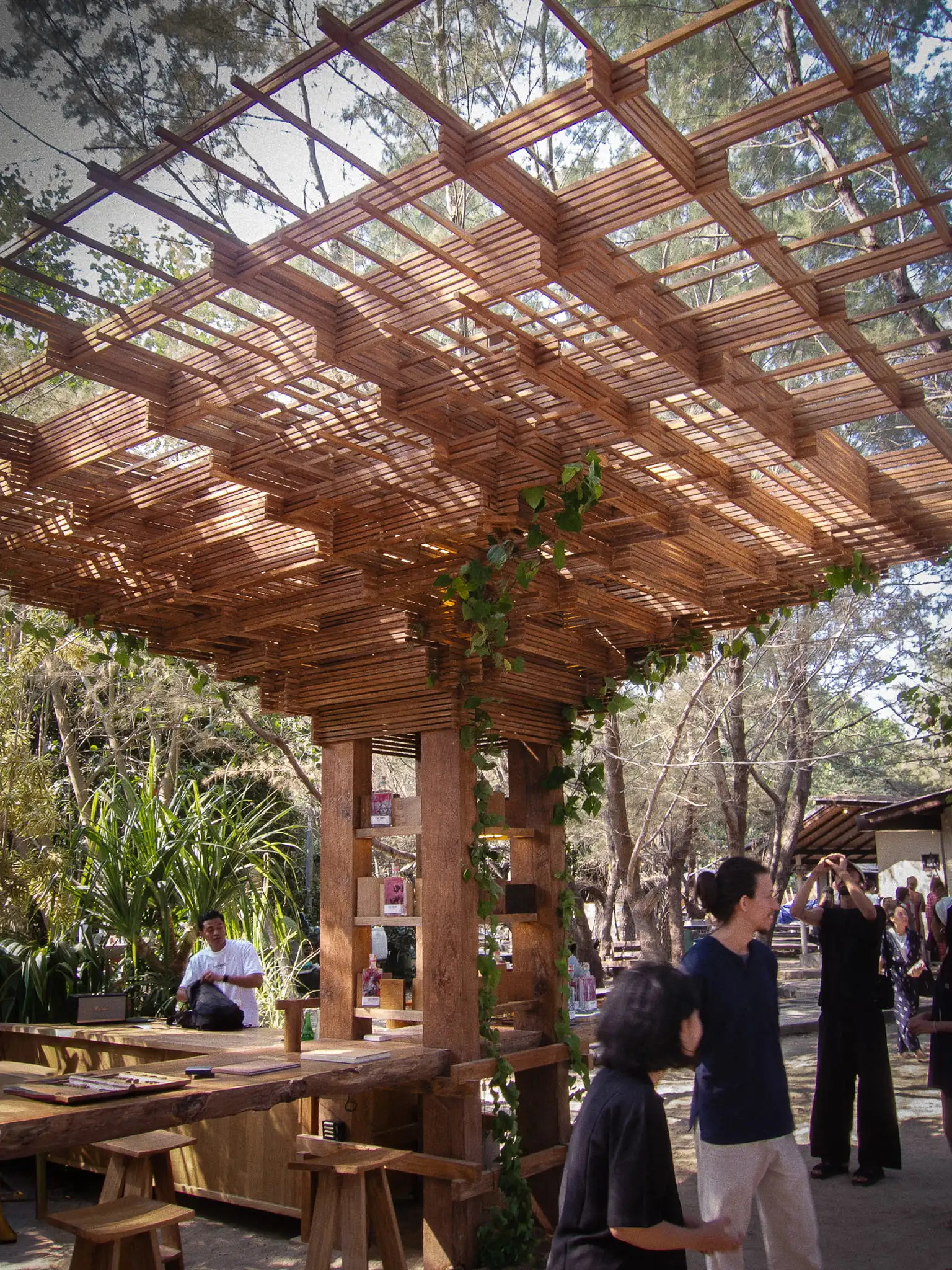Geometric timber canopy of the Main Main pavilion by Blancostudio at Jia Curated 2026