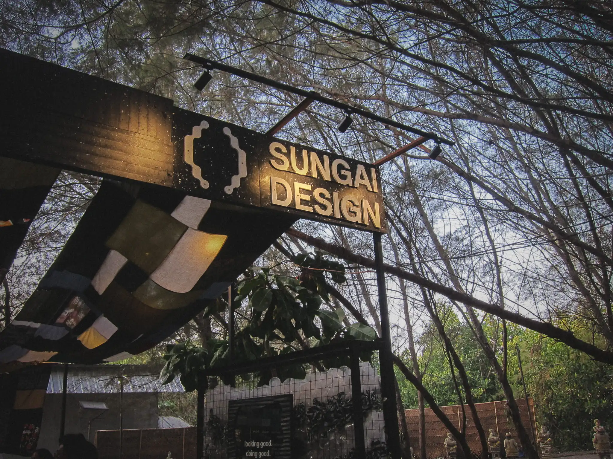 Sungai Design exhibition booth beneath the trees at Jia Curated 2026